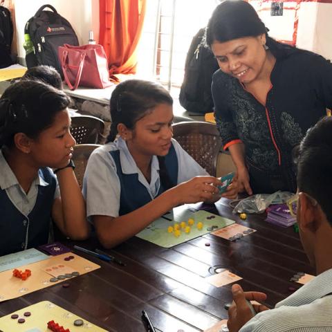 Students play card games